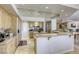 Spacious kitchen featuring granite countertops, custom cabinetry, and stainless steel appliances at 9905 Fox Springs Dr, Las Vegas, NV 89117