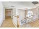 Beautiful foyer with a staircase, decorative chandelier, and lots of natural light at 9905 Fox Springs Dr, Las Vegas, NV 89117