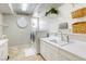 Bright laundry room with modern washer/dryer, ample counter space, and charming decorative accents at 9905 Fox Springs Dr, Las Vegas, NV 89117