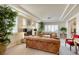Bright living room boasting a fireplace, large windows, and comfortable seating at 9905 Fox Springs Dr, Las Vegas, NV 89117