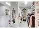 Spacious walk-in closet with custom shelving for clothing, shoes, and accessories at 9905 Fox Springs Dr, Las Vegas, NV 89117