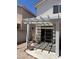 Backyard with patio and exterior wall at 9940 Trailing Vine St, Las Vegas, NV 89183