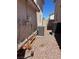 Side yard with AC and gravel walkway at 9940 Trailing Vine St, Las Vegas, NV 89183