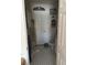 Hall bathroom with white cabinets and door at 9940 Trailing Vine St, Las Vegas, NV 89183