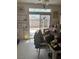 View of the dining room and backyard entrance at 9940 Trailing Vine St, Las Vegas, NV 89183