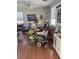 View of the living room with hardwood floors and several windows at 9940 Trailing Vine St, Las Vegas, NV 89183