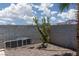 Landscaped backyard with decorative gravel and block wall, offering a private outdoor space at 998 Hunters Run Dr, Henderson, NV 89002