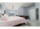 Serene primary bedroom with a private patio, calming decor, and an inviting atmosphere, perfect for relaxation at 998 Hunters Run Dr, Henderson, NV 89002