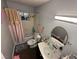 Bathroom featuring a vanity sink, toilet, and shower-tub combination at , Las Vegas, NV 89104