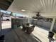 Covered outdoor patio with ceiling fan, patio furniture, concrete floor, and a privacy screen at , Las Vegas, NV 89104