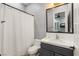 Clean bathroom with tub and shower combination and modern fixtures and vanity at 1 Dry Brook Trl, Henderson, NV 89052