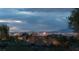 Panoramic view of the city skyline at night, highlighting the vibrant cityscape and distant mountains at 1 Dry Brook Trl, Henderson, NV 89052