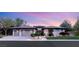 Beautiful single-story home with three-car garage, tile roof, and pristine landscaping at 1 Dry Brook Trl, Henderson, NV 89052