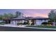 Stunning single-story home with a tile roof, three-car garage, and well-manicured landscaping at 1 Dry Brook Trl, Henderson, NV 89052