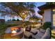 Relaxing backyard fire pit with comfortable seating, offering a perfect spot for evening gatherings and cozy nights at 1 Dry Brook Trl, Henderson, NV 89052