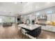 Spacious open kitchen with hardwood floors, island, and stainless steel appliances at 1 Dry Brook Trl, Henderson, NV 89052