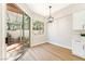 Cozy dining nook with sliding doors providing backyard views and natural light at 10017 Snow Crest Pl, Las Vegas, NV 89134
