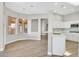 Modern kitchen with white cabinets, stainless steel appliances, and ample counter space at 10700 Button Willow Dr, Las Vegas, NV 89134