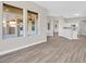 Inviting living area featuring luxury vinyl flooring, recessed lights, and backyard access at 10700 Button Willow Dr, Las Vegas, NV 89134