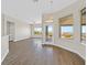 A bright living area with hard floors, multiple windows, and mountain views at 10700 Button Willow Dr, Las Vegas, NV 89134