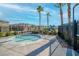 Relaxing community splash pool area featuring a black metal safety fence at 12112 Polar White Ct # 3, Las Vegas, NV 89183