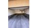 Spacious two car garage with overhead storage and painted floor at 12112 Polar White Ct # 3, Las Vegas, NV 89183