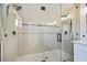 Spa-like walk-in shower features glass enclosure, dual shower heads and tile surround at 1312 Pacific Terrace Dr, Las Vegas, NV 89128