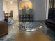 Bright living area with modern decor, bar seating area and partial view of kitchen at 1515 E Reno Ave # D202, Las Vegas, NV 89119
