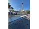 Street view of a modest home with a fenced yard in an urban setting near the Stratosphere at 1713 Fairfield Ave, Las Vegas, NV 89102