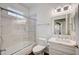 Modern bathroom with shower-tub combo, tile walls, and sleek vanity at 2050 W Warm Springs Rd # 4512, Henderson, NV 89014
