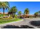 Resort Villas entrance with lush landscaping and palm trees at 2050 W Warm Springs Rd # 4512, Henderson, NV 89014