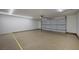 Three car garage featuring epoxy flooring and plenty of room for vehicles at 2050 W Warm Springs Rd # 4512, Henderson, NV 89014