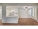 Bright living room with an open floor plan, a breakfast bar, and lots of natural light at 2050 W Warm Springs Rd # 4512, Henderson, NV 89014