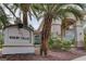 Resort Villas community sign surrounded by palm trees and landscaped beds at 2050 W Warm Springs Rd # 4512, Henderson, NV 89014