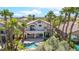 Aerial view of home showcasing the private backyard with pool and palm trees at 2221 Grier Woods Ct, Las Vegas, NV 89134