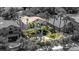 Aerial view of a well-maintained home with a backyard pool and mature palm trees at 2221 Grier Woods Ct, Las Vegas, NV 89134