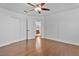 Bedroom features hardwood floors, a ceiling fan, and a closet at 2221 Grier Woods Ct, Las Vegas, NV 89134