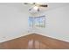 Bedroom with hardwood flooring, ceiling fan, and window at 2221 Grier Woods Ct, Las Vegas, NV 89134