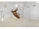 Elegant foyer featuring a curved staircase, high ceilings, and tile floors at 2221 Grier Woods Ct, Las Vegas, NV 89134
