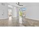 A primary bedroom is decorated with marble flooring, ceiling fan, and access to a private balcony at 2221 Grier Woods Ct, Las Vegas, NV 89134