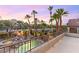 Inviting backyard pool and spa with beautiful waterfall features and lush landscaping at 2221 Grier Woods Ct, Las Vegas, NV 89134