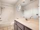 Bathroom with single vanity, tile flooring, and shower-tub combination at 2705 Chokecherry Ave, Henderson, NV 89074