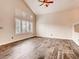 Serene bedroom featuring wood floors and plantation shutters at 2705 Chokecherry Ave, Henderson, NV 89074