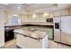 Well-lit kitchen featuring granite countertops and stainless steel appliances at 2705 Chokecherry Ave, Henderson, NV 89074