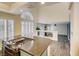 Contemporary kitchen featuring a central island and ample counter space at 2705 Chokecherry Ave, Henderson, NV 89074