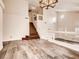 Open-concept living area boasting hardwood floors and large windows at 2705 Chokecherry Ave, Henderson, NV 89074