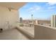 Enjoy breathtaking city views from this spacious balcony with glass railings at 2747 Paradise Rd # 2704, Las Vegas, NV 89109
