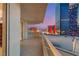 Balcony featuring city views, tile flooring, and glass railing, a luxurious outdoor space at 2747 Paradise Rd # 2704, Las Vegas, NV 89109