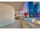 Wide balcony with tile flooring and glass railing, displaying views of the city at 2747 Paradise Rd # 2704, Las Vegas, NV 89109