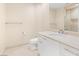 Well-lit bathroom with a modern vanity, spacious countertop, and glass-enclosed shower at 2747 Paradise Rd # 2704, Las Vegas, NV 89109